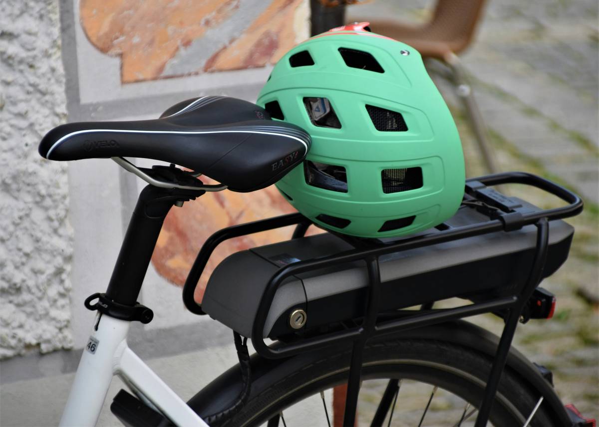 a green bike helmet is waiting for the next trip