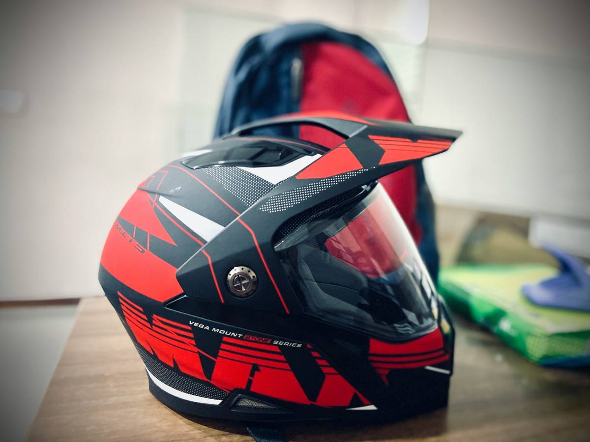 Close-up of guard peak safety helmet showing shell integrity and fit adjustment system
